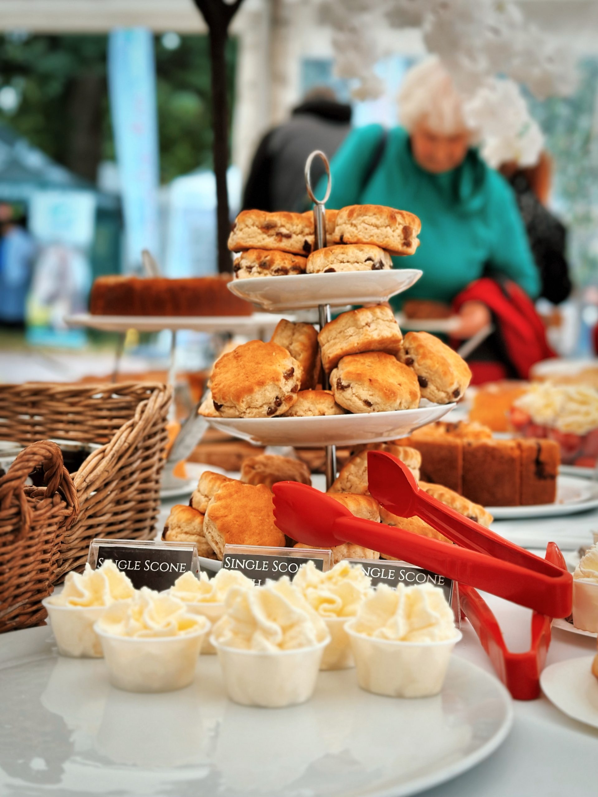 A plate of scones in a marquee